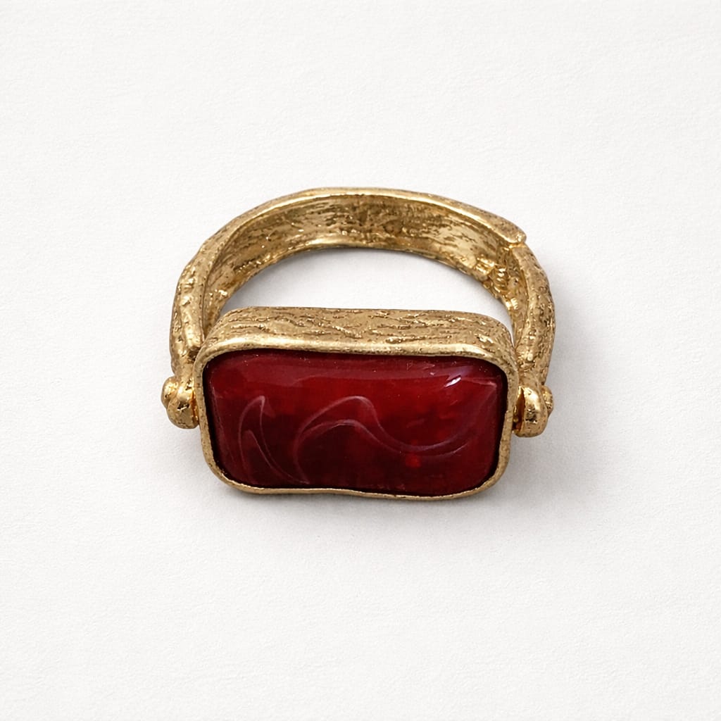 Bracciale Rosso con Montatura Dorata