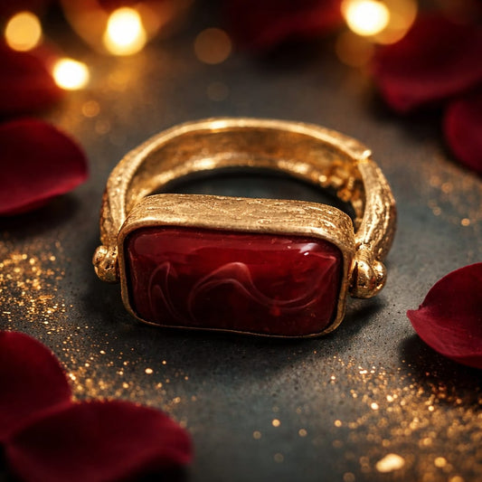 Bracciale Rosso con Montatura Dorata